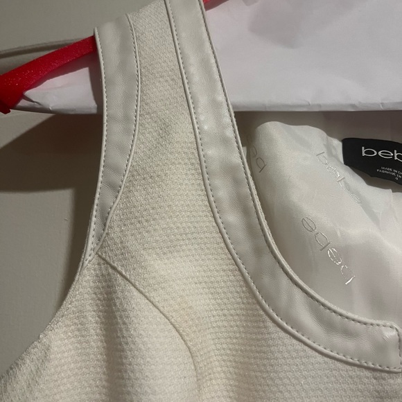 Beautiful fitted top with leather trim around neck area . - Picture 2 of 4